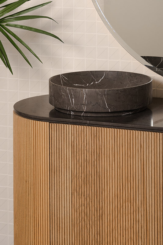 arc wall mounted washbasins in marble pietra grey